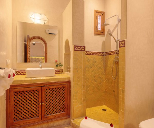 Traditional riad courtyard at Dar Azal in the heart of Marrakech medina with authentic Moroccan tilework